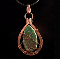 Chrysocolla pendant with copper frame