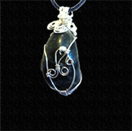 Emerald pendant sterilng silver wrap