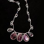 Titania - Amethyst in silver teardrop frame and handmade links