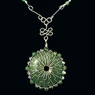 Green aventurine donut with silver and aventurine beads