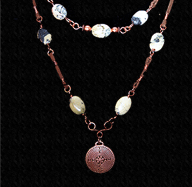 Copper Labryinth necklace with yellow turquoise